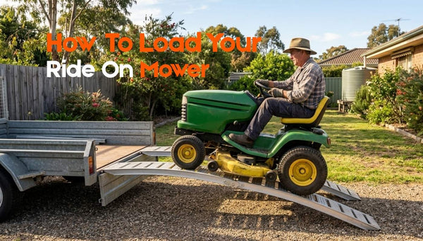 side profile of curved aluminium mower ramps spanning from ground to box trailer