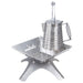 Winnerwell stainless steel camping coffee percolator in use on an outdoor fire pit