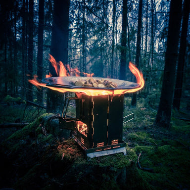 Winnerwell Mini Multi-functional BBQ Smoker burning at campsite — portable camping smoker and firepit outdoors